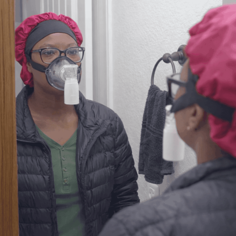 A-woman-with-a-nebulizer-mask-2-768x768